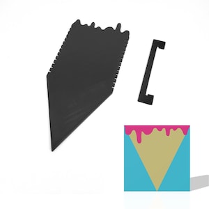 May include: Black ice cream cone shaped mold with a handle. The mold is made of plastic and has a textured surface. The mold is designed to create ice cream cones.