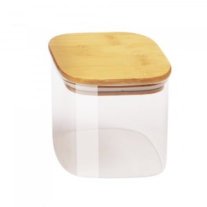 May include: A clear glass storage container with a square shape and a natural bamboo lid. The lid has a slightly rounded edge.