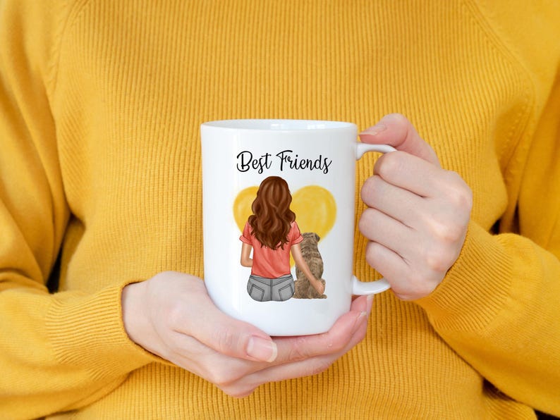 May include: White ceramic mug with the words "Best Friends" in black script. The mug features an illustration of a person with brown hair and a dog, with yellow heart-shaped balloons in the background.