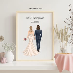 May include: A framed print featuring a back view of a couple holding hands, with the bride in a white gown and the groom in a dark suit. The text "Mr & Mrs Smith" and the date "23.03.2026" are printed in black above the figures on a white background.