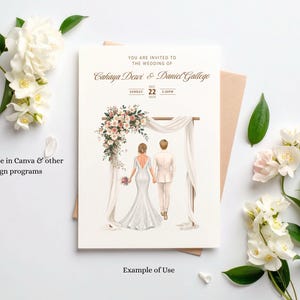 May include: A wedding invitation card featuring an illustration of a couple standing under a floral arch. The text reads: YOU ARE INVITED TO THE WEDDING OF Cahaya Dewi & Daniel Gallego, SUNDAY DEC 22 2025, 5:00PM. The card is placed on a tan envelope with white flowers.