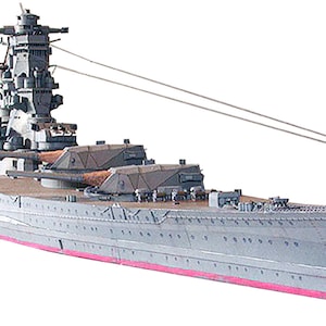 May include: A grey model of a Japanese battleship with a detailed superstructure and multiple gun turrets. The ship has a long, narrow hull and a pointed bow.