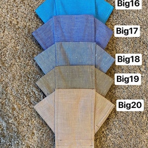 Pode incluir: Cinco m&aacute;scaras de tecido de diferentes cores, empilhadas umas sobre as outras. As m&aacute;scaras s&atilde;o etiquetadas de cima para baixo: Big16, Big17, Big18, Big19, Big20.