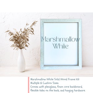 Marshmallow White Solid Wood Farmhouse Picture Frame DIY Kit with plexiglass, foam core, flexible tabs on the back, and hanging hardware.