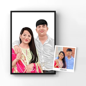 Puede incluir: Un retrato enmarcado de dos personas, una mujer y un hombre joven, con una foto más pequeña de las mismas personas. El retrato está en un marco negro. La mujer viste un atuendo rosa y verde. El joven lleva una camisa blanca.