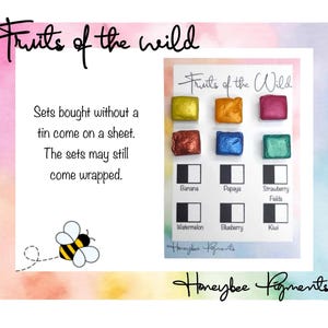 May include: A set of watercolour paints called "Fruits of the Wild" by Honeybee Pigments. The set includes 8 colours: Banana, Papaya, Strawberry Fields, Watermelon, Blueberry, Kiwi, and two other colours. The paints are in small square pans and are arranged in a grid on a white card.