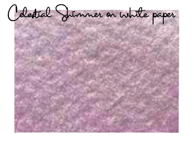 May include: A close-up of a shimmery, iridescent purple and pink paint on white paper. The paint has a textured, almost metallic look.