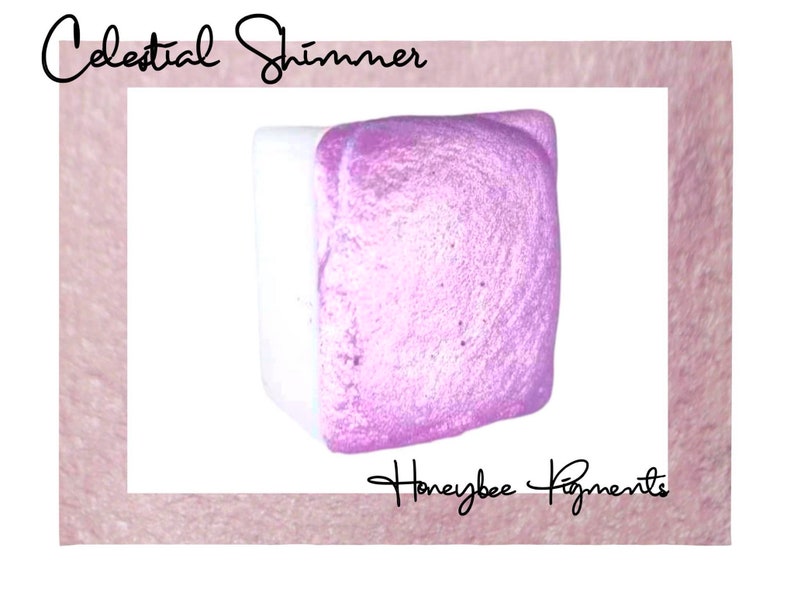 May include: A square, pink, iridescent pigment with the text "Celestial Shimmer" and "Honeybee Pigments" on the label.