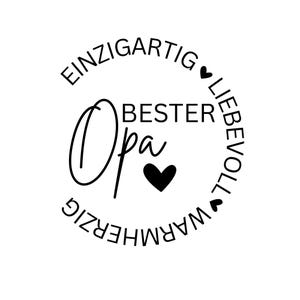 Könnte beinhalten: Ein kreisförmiges Design in Schwarz-Weiß mit den Worten "EINZIGARTIG, LIEBEVOLL, WARMHERZIG" um die Worte "BESTER Opa" und ein schwarzes Herz. Das Design befindet sich auf weißem Hintergrund.