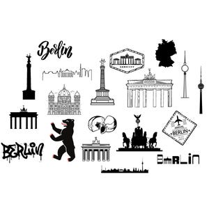 May include: A collection of black and white illustrations of Berlin landmarks and symbols. Includes the Brandenburg Gate, a bear, the Berlin TV Tower, and the word "Berlin" in various fonts. A travel-themed design.