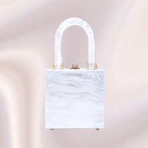 Month of May Pearl White Top Handle Lucite Handbag