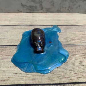 Harshuis Nijlpaard in plas water | Aangepast | Een uit duizenden