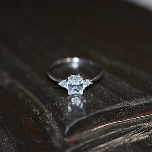 Radiant cut with two triangle Accent statement ring sterling silver