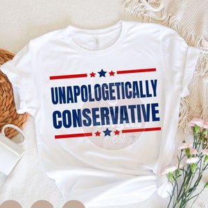 May include: White t-shirt with the text "Unapologetically Conservative" in blue and red letters with stars.