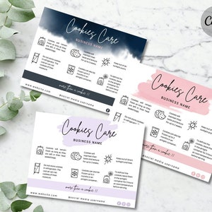 May include: Three rectangular cookie care instruction cards in navy blue, pink, and lavender. Each card features the text Cookies Care, Business Name, and more than a cookie!!, along with icons and text explaining storage, freezing, and defrosting tips.