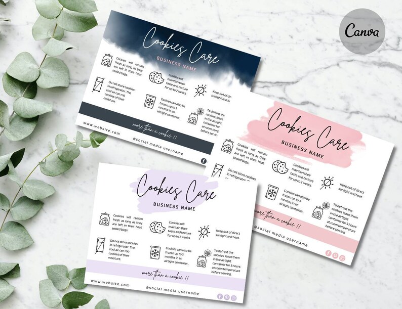 May include: Three rectangular cookie care instruction cards in navy blue, pink, and lavender. Each card features the text Cookies Care, Business Name, and more than a cookie!!, along with icons and text explaining storage, freezing, and defrosting tips.