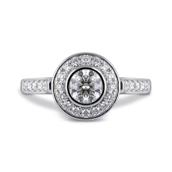 Frank Zampa Diamond Engagement Ring with A Subtle Halo Encrusting The Centre Diamond and An Intricate Designed Ring 14K White Gold