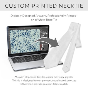 May include: A white custom printed necktie is displayed next to a laptop showing a floral design. The text on the image reads "CUSTOM PRINTED NECKTIE" and "Digitally Designed Artwork, Professionally Printed on a White Base Tie."
