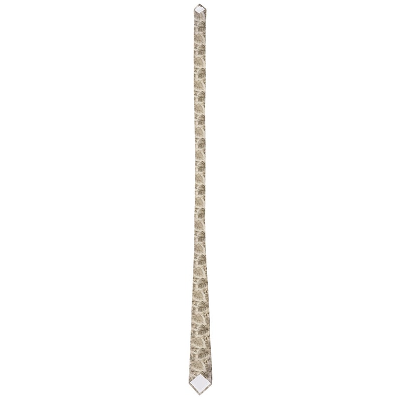 May include: A beige necktie with a repeating pattern of small, stylized leaf shapes. The tie is vertically oriented, with a pointed tip and a small, white label at the end. The overall design is simple and elegant.