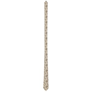 May include: A beige necktie with a repeating pattern of stylized, light brown leaves. The tie is vertically oriented against a white background, showcasing its design and texture. The tie's pointed end is visible.