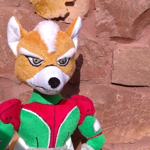 Fox. A Plush Toy Inspired by Fox Mccloud From the Star Fox Video Game