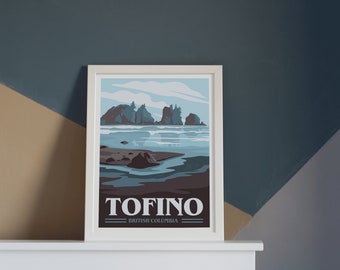 May include: A framed print of a stylized illustration of a beach scene with rocky islands and the text "TOFINO - BRITISH COLUMBIA" at the bottom.