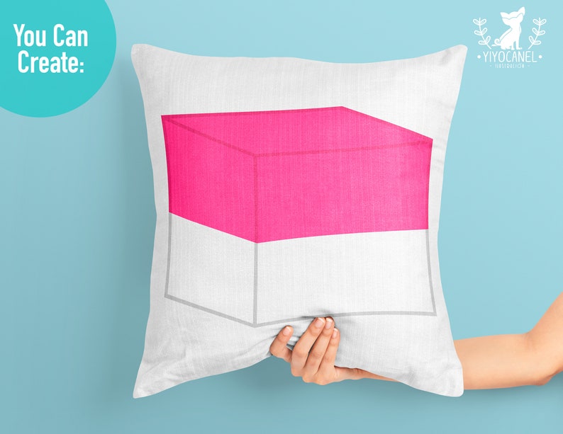 May include: A white pillow with a pink and white geometric design. The design is a cube with a pink top and white bottom.