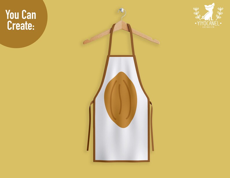 May include: A white apron with brown trim and a large brown coffee bean graphic centered on the front. The apron hangs from a wooden hanger against a solid mustard yellow background. The text "You Can Create:" appears in the top left corner.