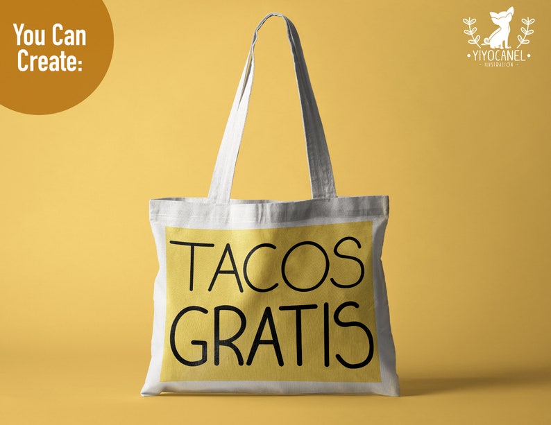 K&ouml;nnte beinhalten: Eine wei&szlig;e Stofftasche mit schwarzen Henkeln und einem gelben Rechteck auf der Vorderseite, auf dem "TACOS GRATIS" steht.