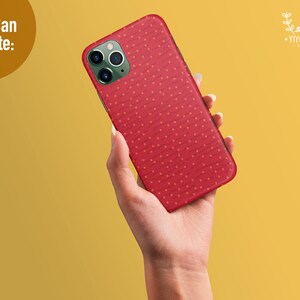 May include: A red smartphone case featuring a pattern of small yellow dots and subtle wavy lines. The case has a cutout for a triple-lens camera system. The text "You Can Create:" appears in the top left, and a logo with the text "YIYOCANEL" is in the top right.