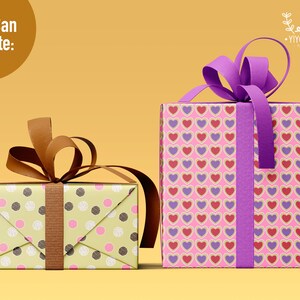 May include: Two rectangular gift boxes. The smaller box is light green with pink and dark brown polka dots and a brown ribbon. The larger box is pink with a repeating pattern of red and purple hearts and a purple ribbon. Text reads You Can Create.