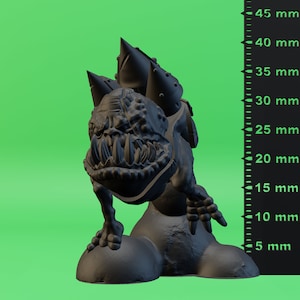 May include: A black, 3D printed miniature of a grotesque, armored creature with sharp teeth and claws. The creature is standing on a rocky base and is approximately 40 mm tall.
