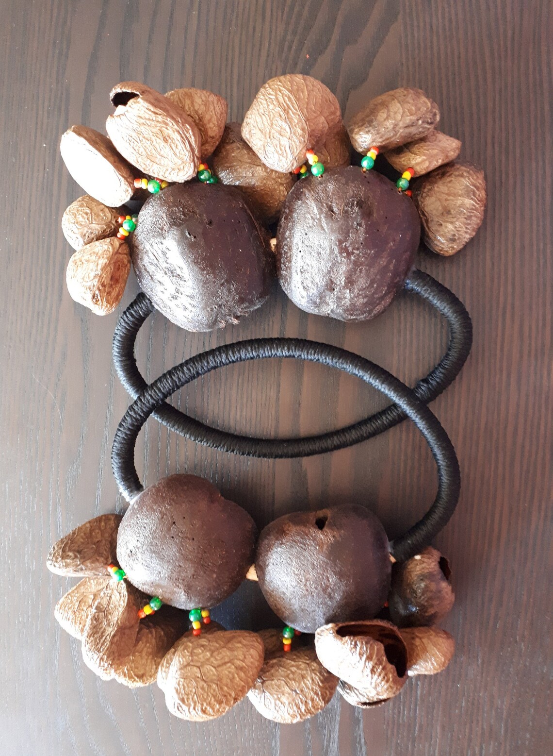 A Handheld shaker made of Tree Nut Shells. Percussion shaker. Etsy