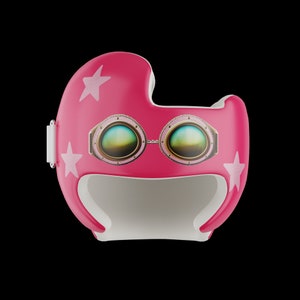 May include: A vibrant pink helmet with a white interior, adorned with star motifs and goggles. The goggles have a gold frame and a connecting chain. A strap is visible on the side. The design is playful and whimsical, suitable for a child.