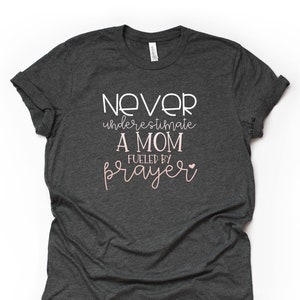 Never Underestimate a Mom Fueled by Prayer Design on premium Bella + Canvas unisex shirt, 3 color choices, plus sizes available, great gift