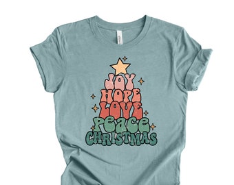 Camiseta con diseño de árbol de Navidad desgastado: Alegría, esperanza, amor y paz.