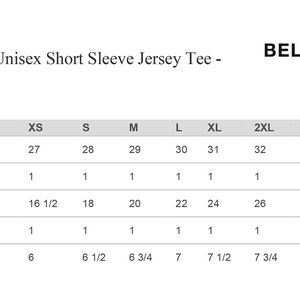 May include: Size chart for a unisex short sleeve jersey tee, showing measurements in inches for body length, body width, and neck size. Sizes range from XS to 5XL.