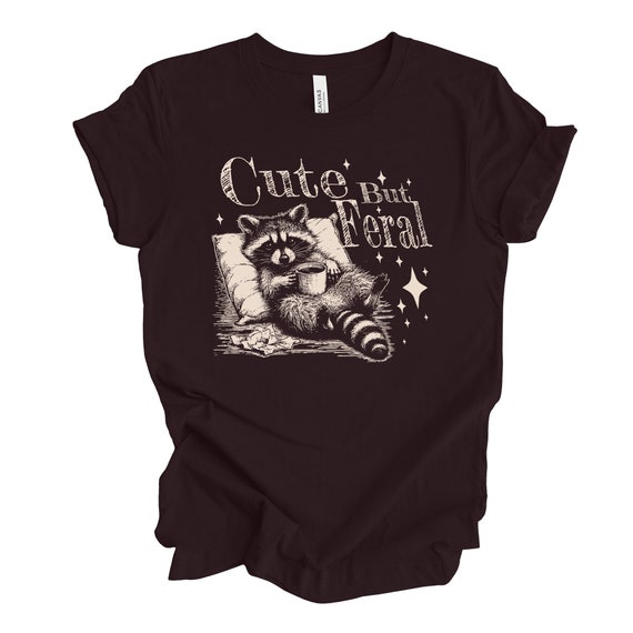 Funny Raccoon Tee, Cute But Feral Raccoon, Raccoon with Coffee Design, premium unisex shirt, 6 color choices, 3x Raccoon, 4X Raccoon