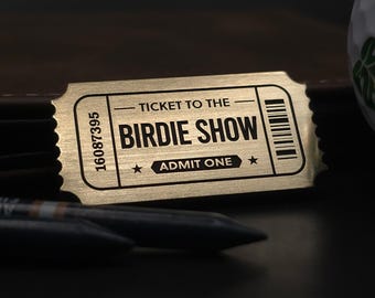 Customised Golf Ball Marker - Ticket to The Birdie Show. Made from solid metal, laser engraved.