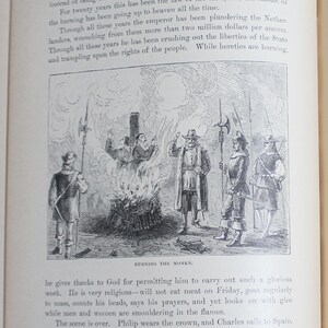 May include: A historical illustration from a book shows the burning of monks. The black and white image features figures in period dress, flames, and text describing the event. The title "Burning the Monks" is at the bottom of the image.