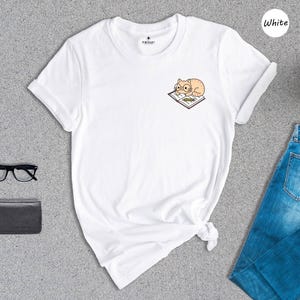 Cat And Book Lover Shirt, Sleeping Cat On Book Pocket Print, Cute Reading Cat Tee, Gift For Cat Moms And Bookworms, Unisex T-Shirt image 5