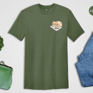 Cat And Book Lover Shirt, Sleeping Cat On Book Pocket Print, Cute Reading Cat Tee, Gift For Cat Moms And Bookworms, Unisex T-Shirt image 6