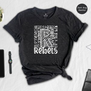 Rebels Fan Shirt Team Mascot Spirit Tee: Vibrant School Pride, Sustainable Materials (Unisex S-XXL, Custom Text Color)