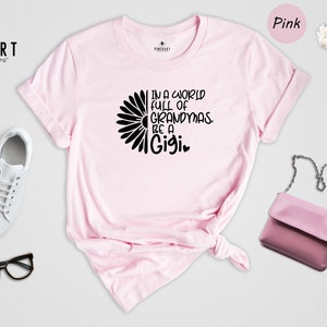 Funny Gigi T-Shirt, In A World Full Of Grandmas Be Gigi, Sunflower Tee for Grandma, Gift for Grandma, Cute Gigi Gift, Grandma Tee Top