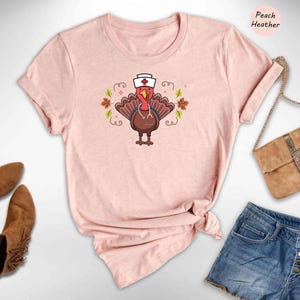 Nurse Turkey Tee: Playful Thanksgiving Design - Soft Cotton, Heather Blend, Cozy Fall Wardrobe image 1