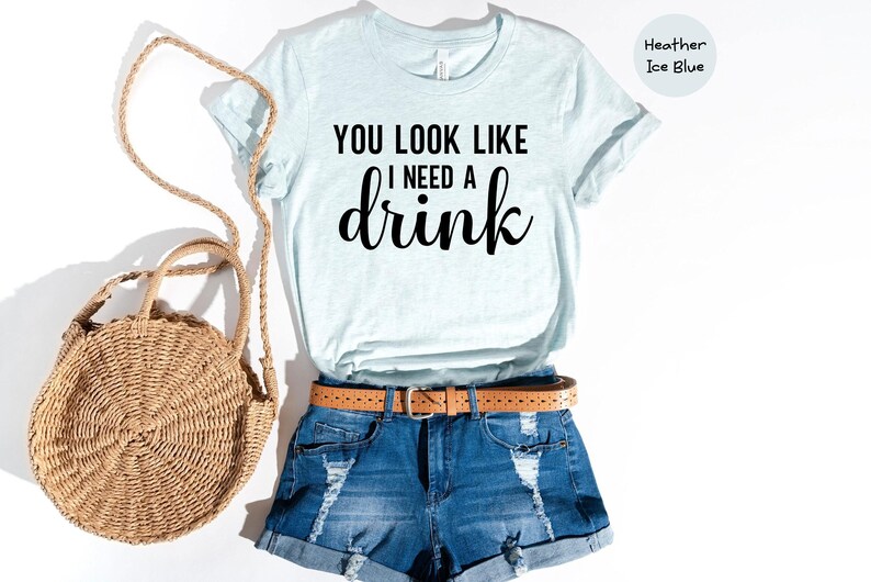 You Look Like Funny Quote Shirt: 'I Need a Drink' Design, Witty Party Tee | Cotton Blend, Eco Friendly, Unisex Sizes S-XXL image 2