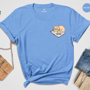 Cat And Book Lover Shirt, Sleeping Cat On Book Pocket Print, Cute Reading Cat Tee, Gift For Cat Moms And Bookworms, Unisex T-Shirt image 3