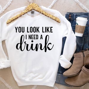 You Look Like Funny Quote Shirt: 'I Need a Drink' Design, Witty Party Tee | Cotton Blend, Eco Friendly, Unisex Sizes S-XXL image 8