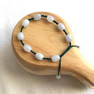 Unik66 Untreated Grade A Oval Jade Beads Bracelet, 9 Pcs, Blue-Green Adjustable String, Unisex For Endless Love, Friendship And Longevity