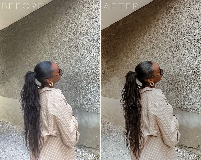 May include: A woman with long, dark hair pulled back in a ponytail is wearing a light brown striped shirt and gold hoop earrings. She is standing in front of a textured gray wall.